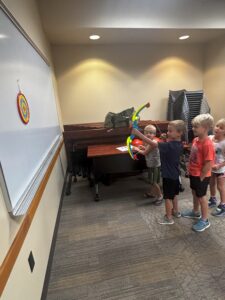 kids shooting toy bow & arrow