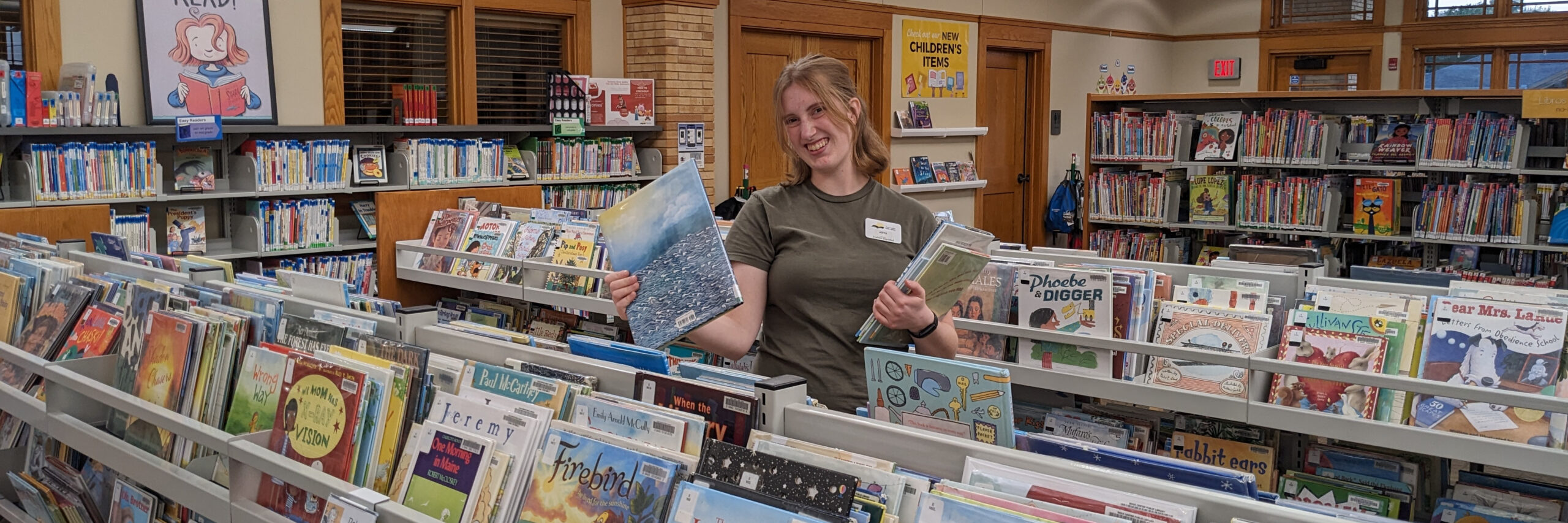 librarian shelving children's books